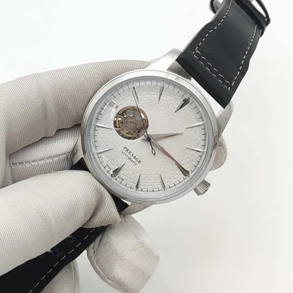 Men-s-Vintage-NH38-Mechanical-Watch-with-Skeleton-Aseptic-Dial-Clear-Glass-Back-Silver-and-Rose-3.webp men-s-vintage-nh38-mechanical-watch-with-skeleton-aseptic-dial-clear-glass-back-silver-and-rose-3-webp