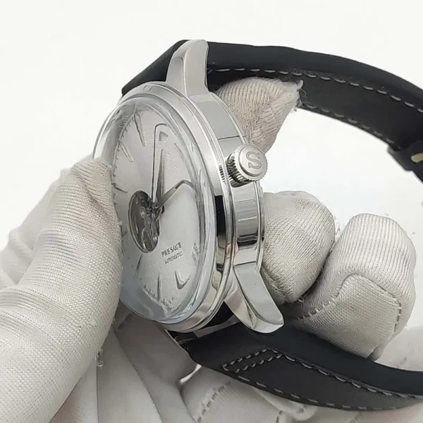 Men-s-Vintage-NH38-Mechanical-Watch-with-Skeleton-Aseptic-Dial-Clear-Glass-Back-Silver-and-Rose-4.webp men-s-vintage-nh38-mechanical-watch-with-skeleton-aseptic-dial-clear-glass-back-silver-and-rose-4-webp